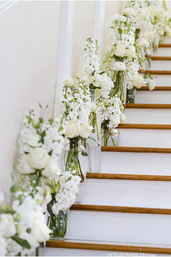 wedding decor ideas- white flowers decorated the staircase