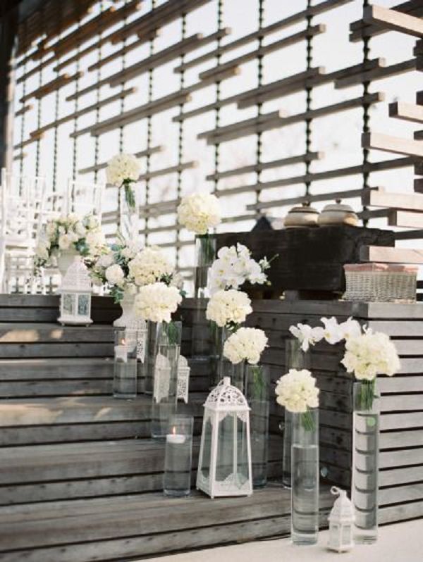 white flowers and white lanterns wedding decor