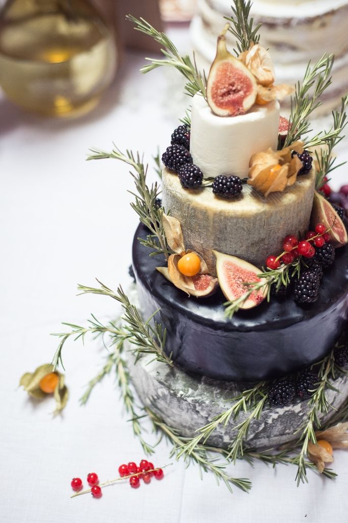 Cheese wedding cake adorned with figs