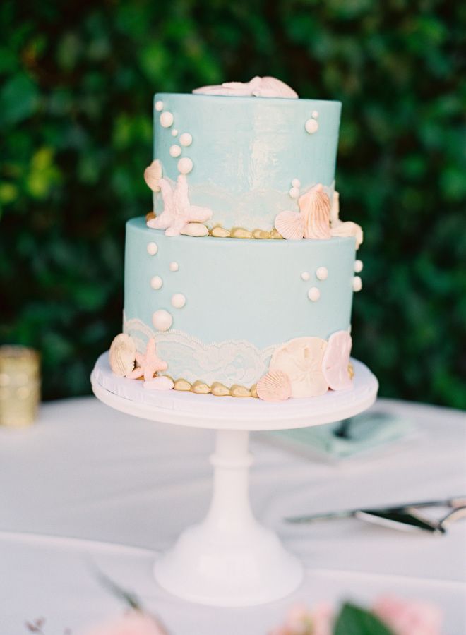 Mermaid light blue beach wedding cake