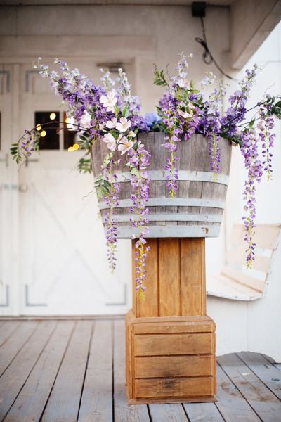 Another 20 Rustic Wine Barrels Wedding Decor Ideas 20 Rustic purple wildflowers with wine barrel and wood boxes