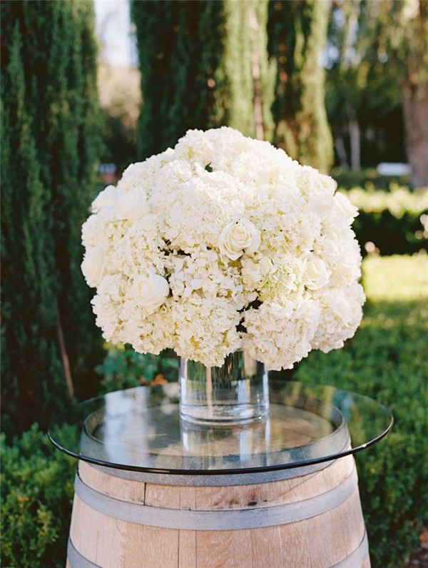 Vineyard Wedding Ideas with White Hydrangeas and Wine Barrel