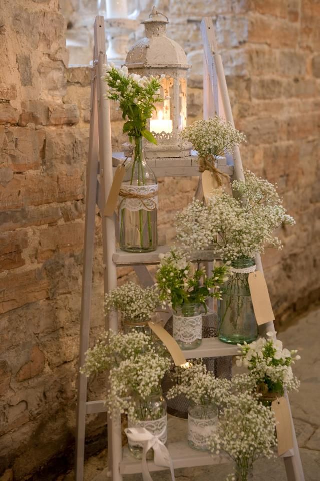 40 Chic Ways to Use Ladder on Rustic / Country Weddings 21 baby's breath in lace mason jar on rustic ladder wedding decotr ideas