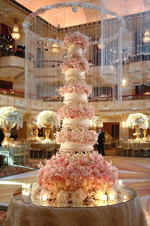 huge wedding cake with pink flowers