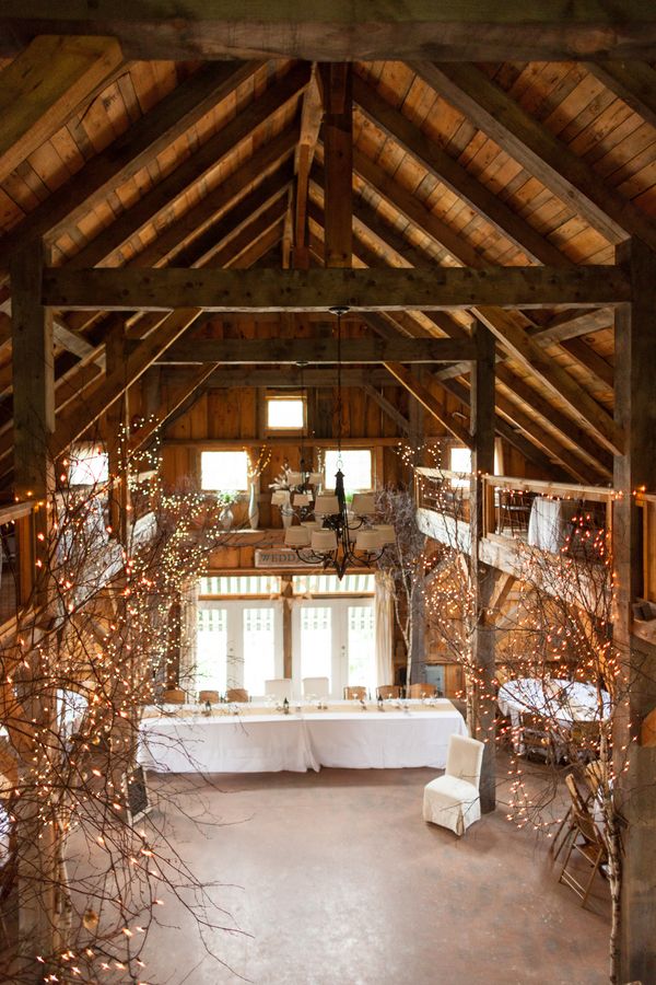 rustic country barn wedding decor with lights