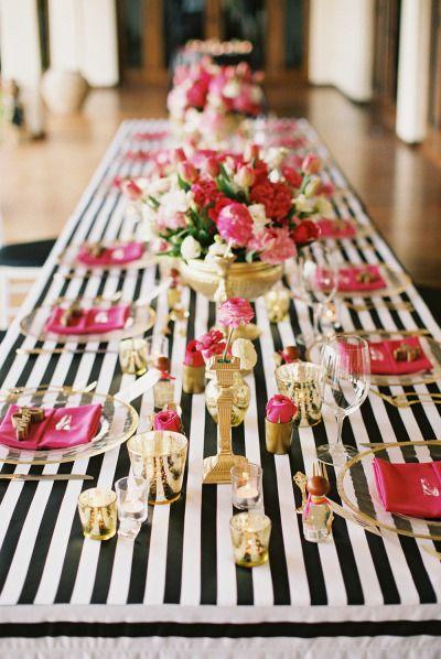 Black and white stripes with bright pink and gold details