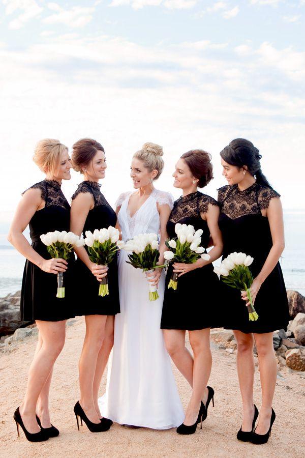 Black and white wedding- bridesmaids in black with white bouquets