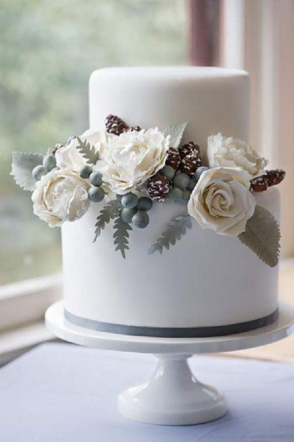Winter Wedding Cake with Pinecones and Berries