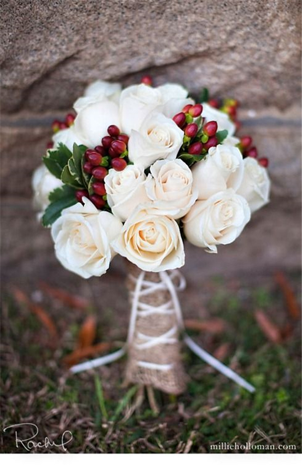 Winter wedding bouquet add silver and sparkly pine cones
