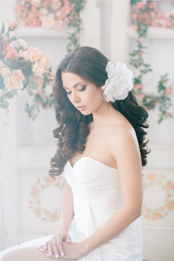 balck wedding hairstyle for long hair with white flower
