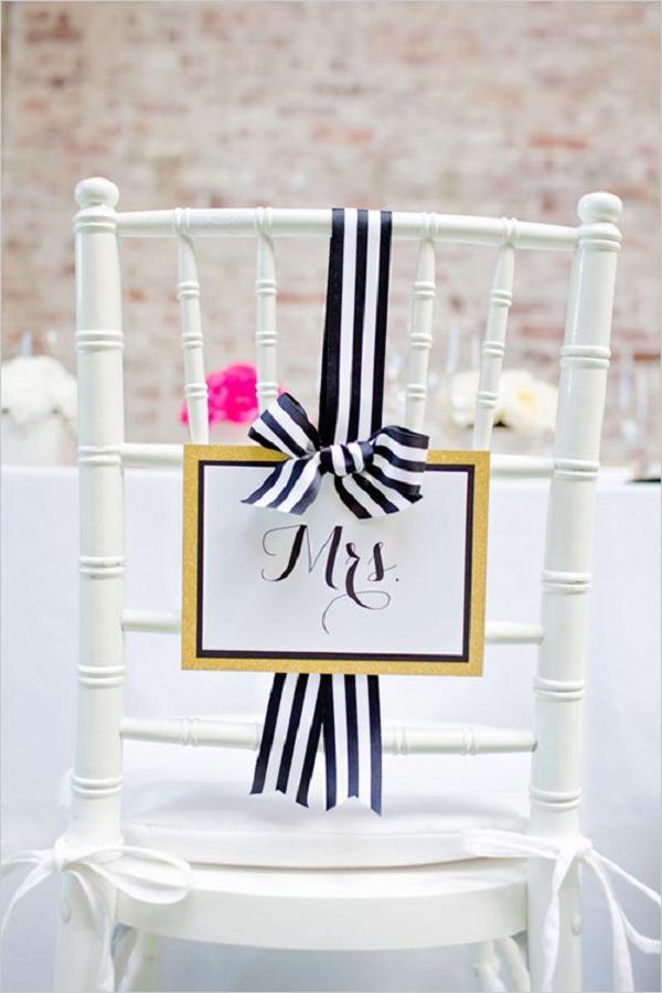 black white and gold mrs wedding seating sign