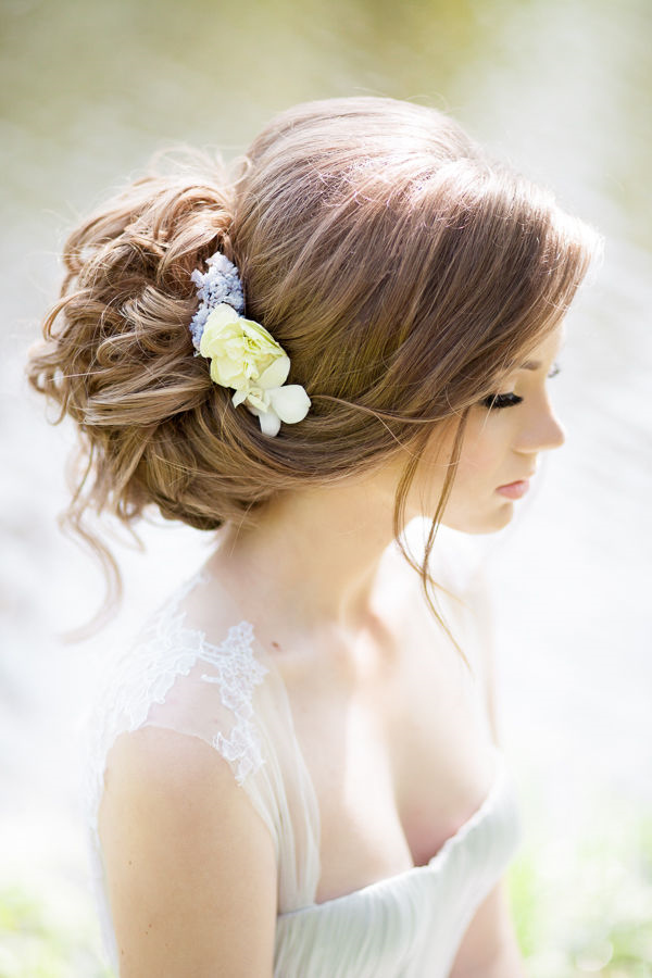bridal updo hairstyles with flower headpiece
