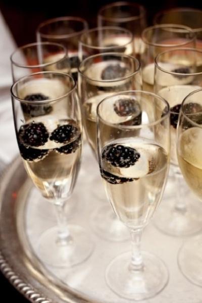 champagne and black berry drink for your reception