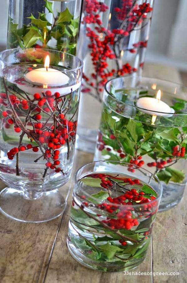 30 Red and Green Scandinavian Winter Wedding Ideas 23 clear glass vases, berries and greenery and floating candles Christmas Centerpiece