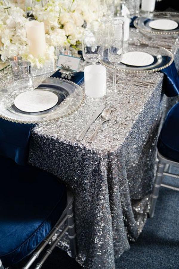 cute silver sequin and white flowers winter wedding table setting