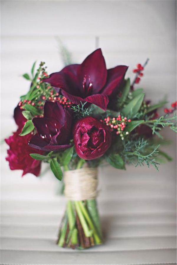 dark red amaryllis winter wedding bouquet