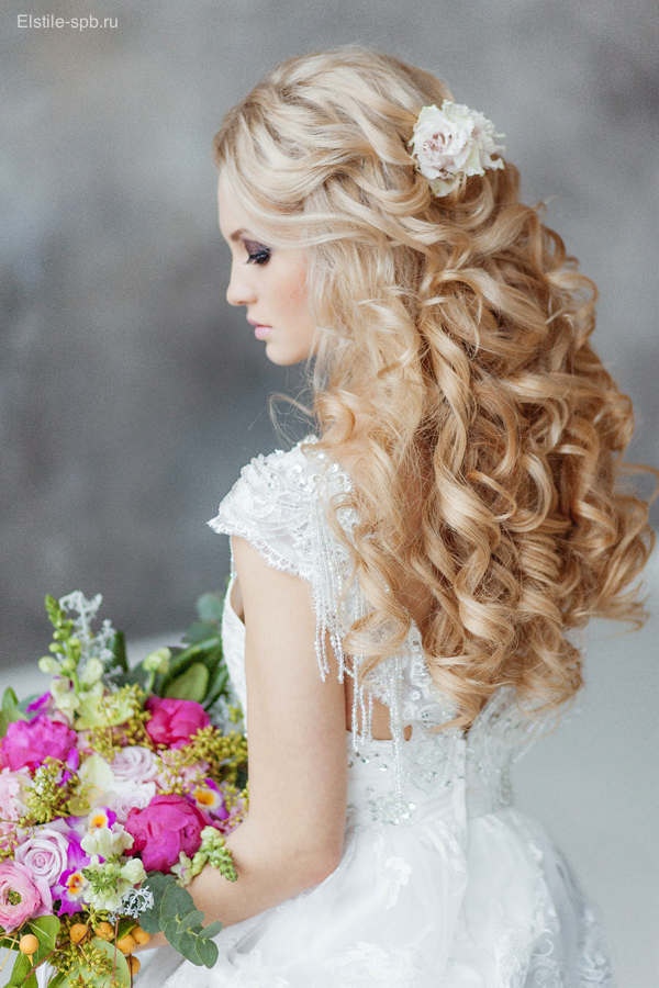 half up half down long wavy wedding hairstyle with flowers