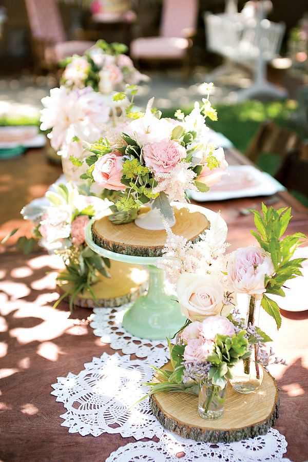 lace and wood mint and pink flowers wedding tablescape