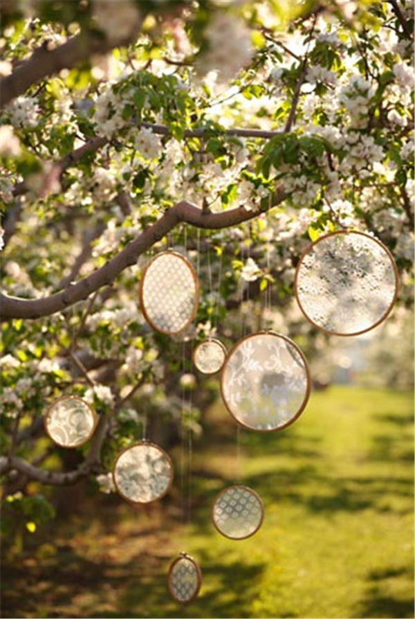 lace in embroidery hoops would be super cute rustic decoration