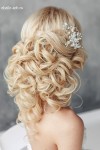 long wavy wedding updo hairstyle with hairpieces