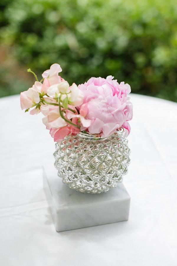 pink flowers in silvervase wedding decor