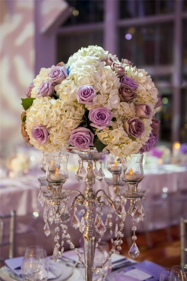 tall white and lilac wedding centerpiece