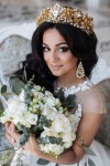 vinatge long wavy wedding hairstyle with gold pricess crown