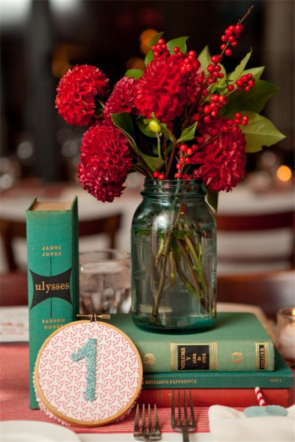 vintage book and flower wedding centerpiece