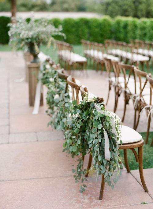 Eucalyptus chairs wedding decor