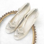 Hand-embroidered with baguette crystals, beads, pearls and rhinestone wedding shoes