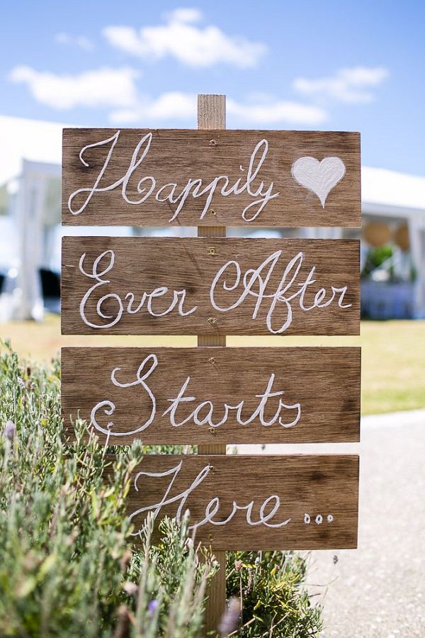 Happily Ever After Starts Here wedding signage