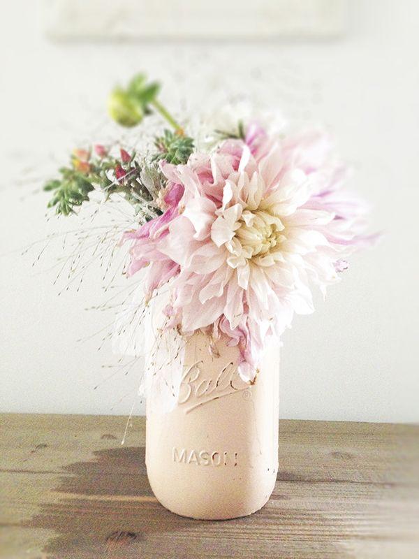 Light pink mason jar with spring floral arrangement