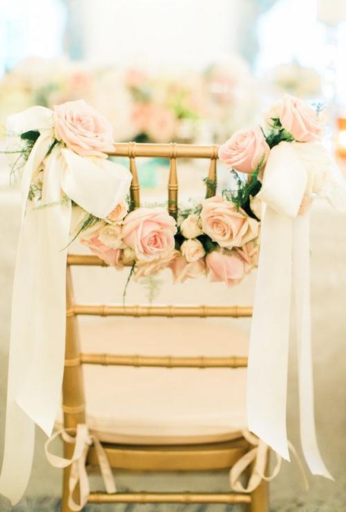 Rose and ribbon garland wedding chair decor ideas