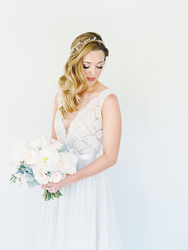 beach lace and tulle wedding dress and vintage wedding hairstyle