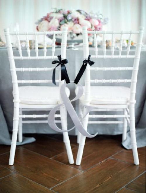 30+ Signage Wedding Chair Decor Ideas We Love 23 black and white wedding chair ideas