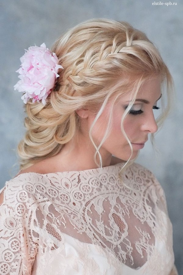braided wedding hairstyle with pink flowers