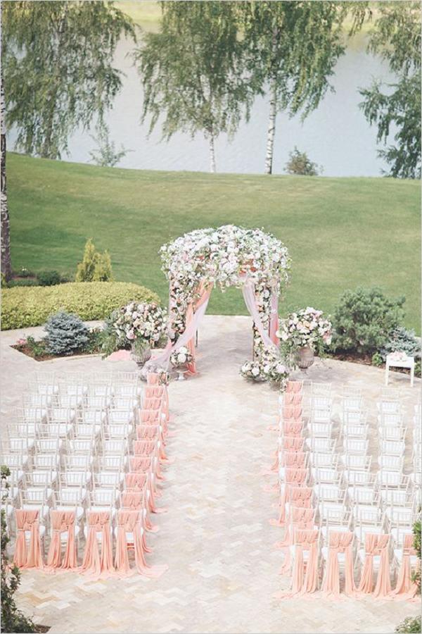 floral wedding arch and pink wedding ceremony decor ideas
