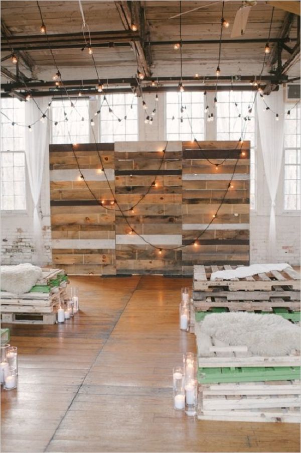 industrial wedding decor ideas with pallets and hanging lightin