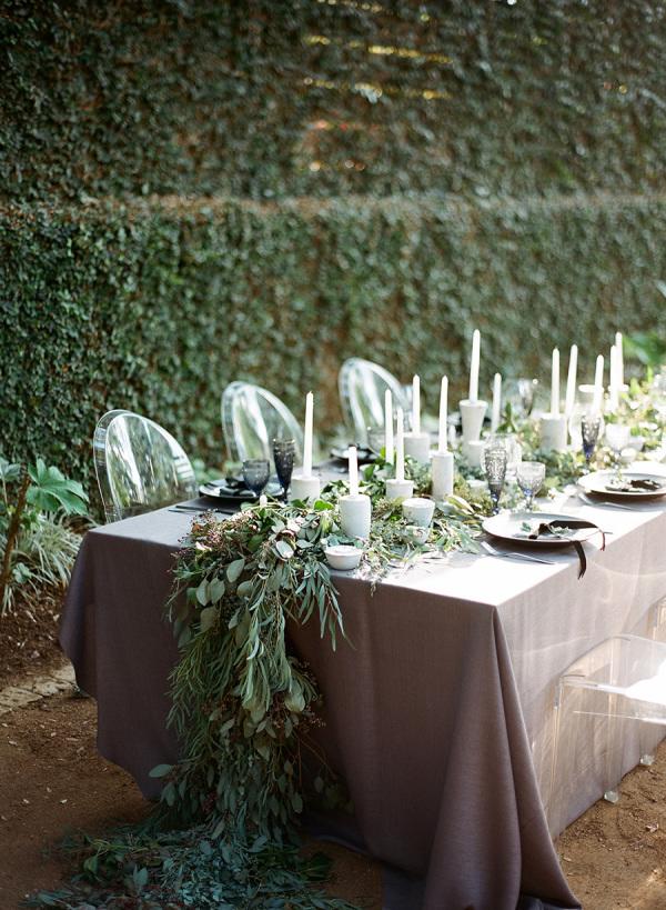 outside green and candle winter wedding table decor