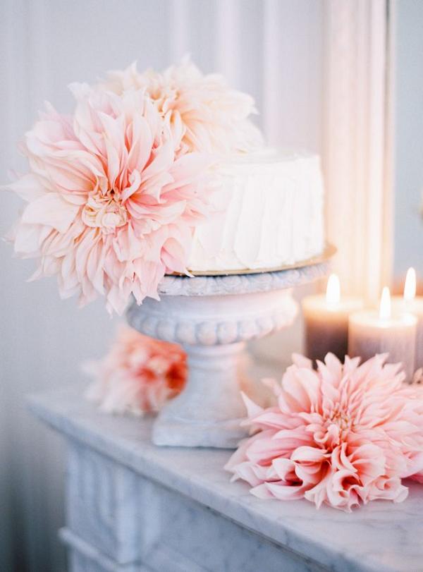 pink dahlia covered wedding cake