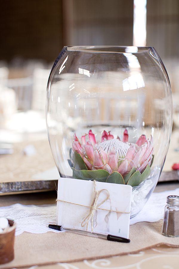 rustic pink protea flower wedding centerpiece