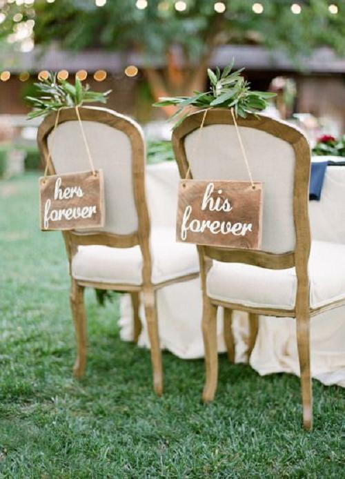 rustic wedding chair with wood sign