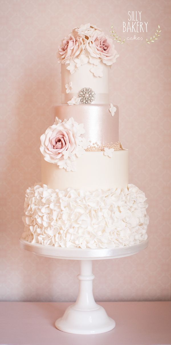 vintage white ruffles and pink flowers wedding cake