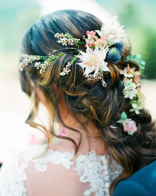 boho wedding hairstyle idea with wildflowers