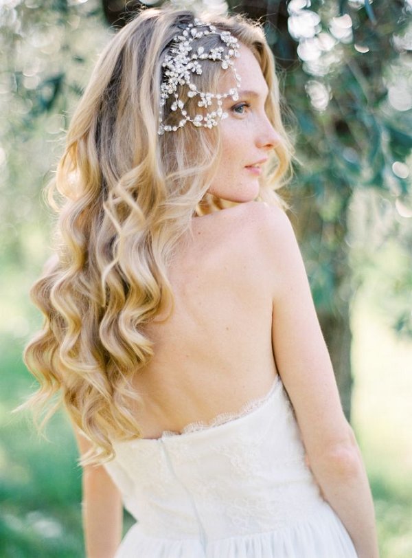 long wavy down wedding hairstyle with jeweled bridal hair pin