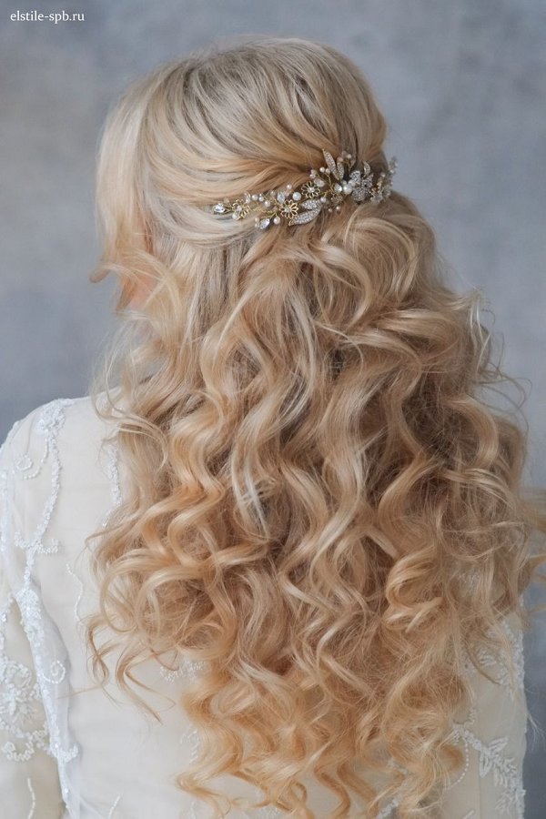 long wavy half up half down wedding hairstyle with pearl hairpiece