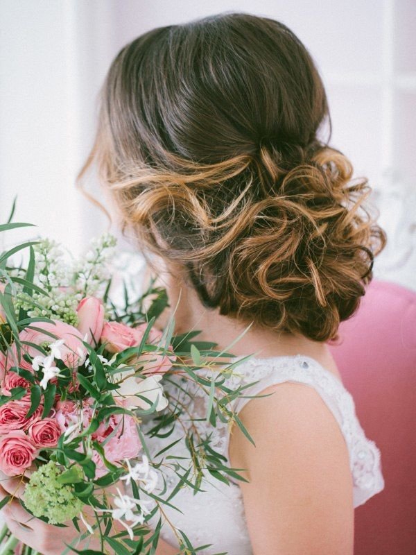 long wavy wedding updo highlight color