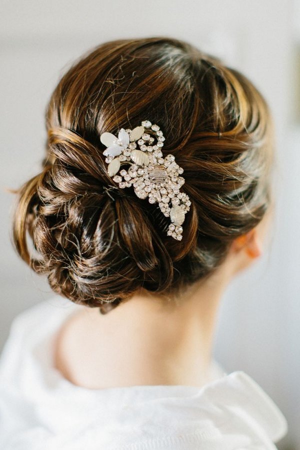 low wedding updo with hairpiece