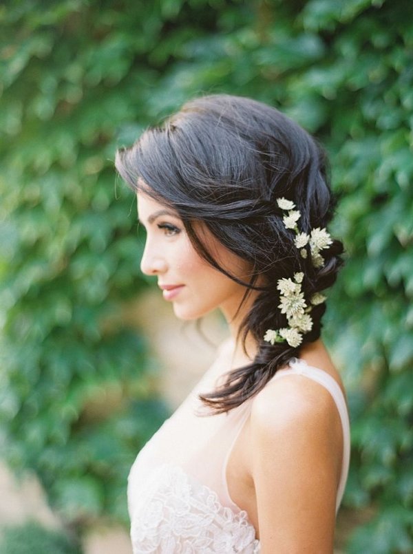 rustic medium wedding hairstyle with flowers