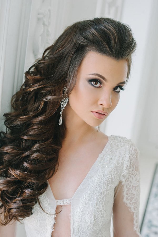 side down long curly hairstyle for bride